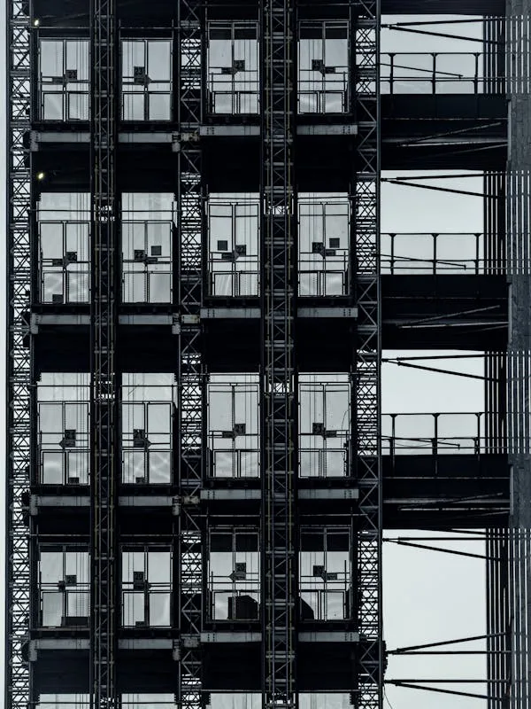 Close-up of industrial insulated glass panels in a high-rise structure, ideal for temperature control and noise reduction.